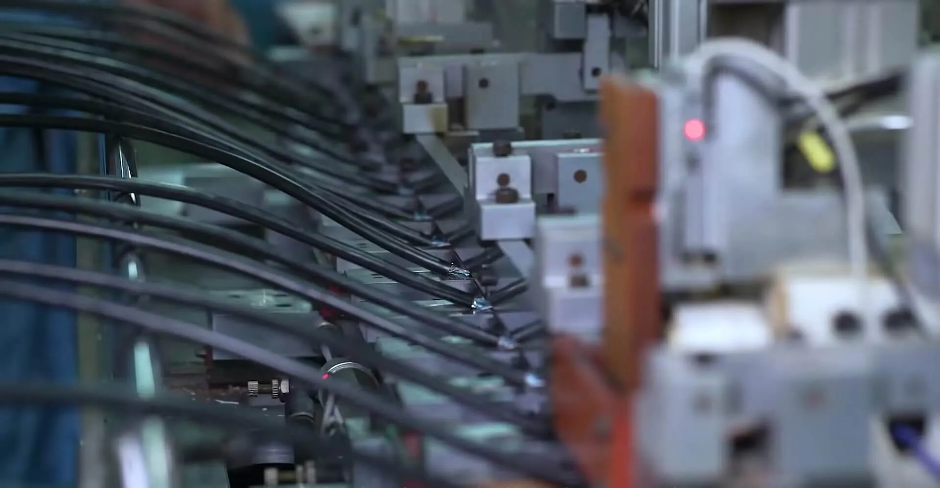 Cables being terminated on an automated crimping line