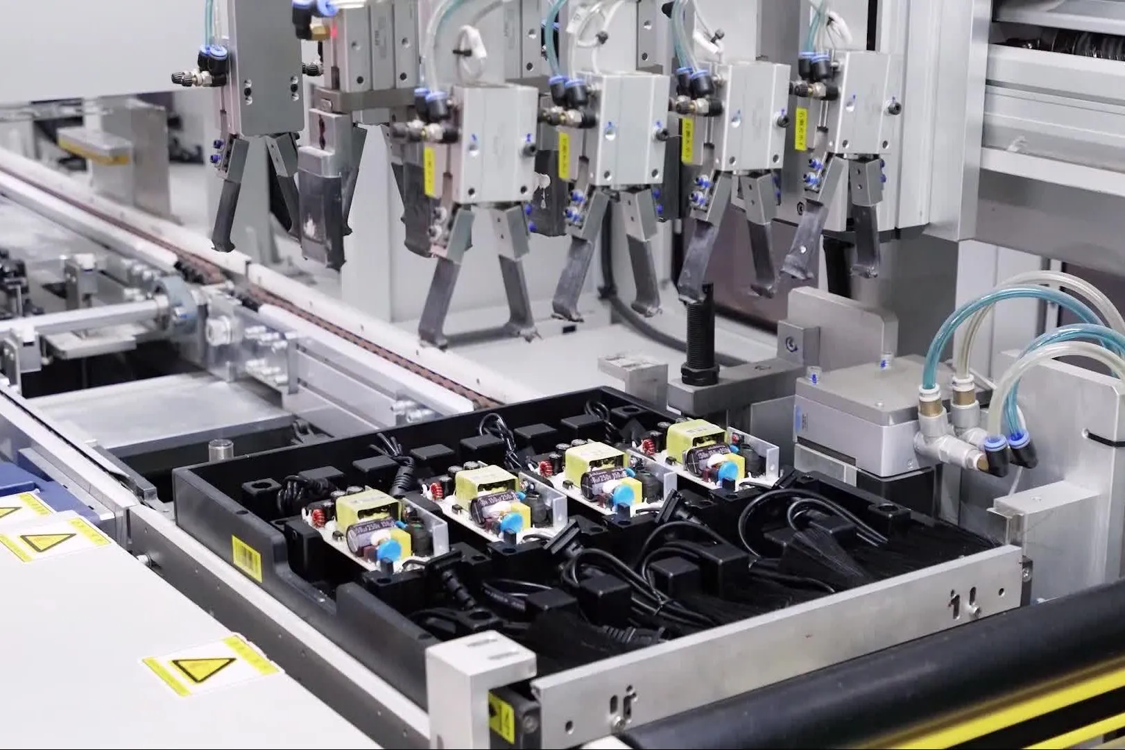 Automated line handling open switching-power-supply boards