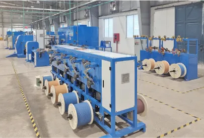 Row of wire-bunching machines with copper and tinned spools